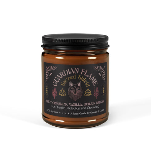 Amber glass jar with Guardian Flame label featuring a metallic wolf and flame motifs in pink and gold. Spicy cinnamon, vanilla, and gurjun balsam candle. 9 oz soy candle by Grimoire & Goblet.
